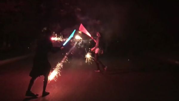 #WeeklyChallenge1 - 360 roman candle shots vs 2 idiots with lightsabers - Sputnik International