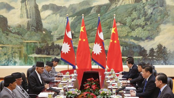 Chinese President Xi Jinping (2nd R) attends a meeting with Nepalese Prime Minister K.P. Sharma Oli (2nd L) at the Great Hall of the People in Beijing on March 21, 2016 Chinese President Xi Jinping (2nd R) attends a meeting with Nepalese Prime Minister K.P. Sharma Oli (2nd L) at the Great Hall of the People in Beijing on March 21, 2016 - Sputnik International