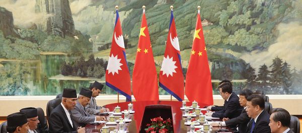 Chinese President Xi Jinping (2nd R) attends a meeting with Nepalese Prime Minister K.P. Sharma Oli (2nd L) at the Great Hall of the People in Beijing on March 21, 2016 Chinese President Xi Jinping (2nd R) attends a meeting with Nepalese Prime Minister K.P. Sharma Oli (2nd L) at the Great Hall of the People in Beijing on March 21, 2016 - Sputnik International