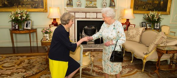 Queen Elizabeth II welcomes Theresa May, left, at the start of an audience in Buckingham Palace, London, where she invited the former Home Secretary to become Prime Minister and form a new government, Wednesday July 13, 2016 - Sputnik International
