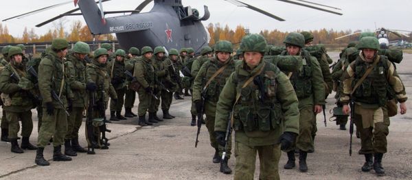 Paratroopers gathered round a Mil Mi-26 helicopter during drills involving the airforce of the Western Military District, Pskov Region, Russia Paratroopers gathered round a Mil Mi-26 helicopter during drills involving the airforce of the Western Military District, Pskov Region, Russia - Sputnik International