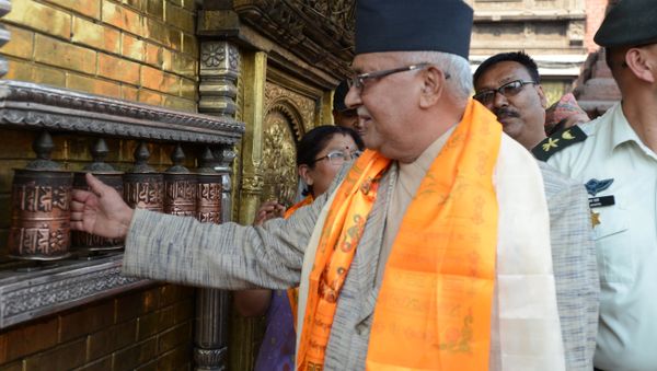 Nepalese Prime Minister KP Sharma Oli spins prayer wheels (File) - Sputnik International