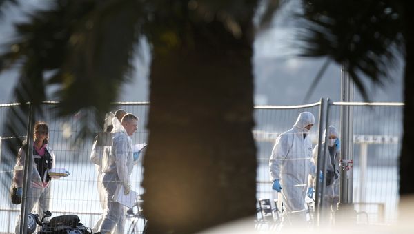 French forensic police continue their investigation as they gather clues the day after a truck at high speed ran into a crowd killing scores celebrating the Bastille Day July 14 national holiday on the Promenade des Anglais in Nice, France, July 15, 2016. French forensic police continue their investigation as they gather clues the day after a truck at high speed ran into a crowd killing scores celebrating the Bastille Day July 14 national holiday on the Promenade des Anglais in Nice, France, July 15, 2016. - Sputnik International