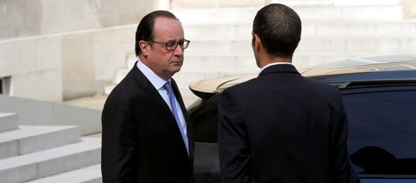 French President Francois Hollande leaves the Elysee Palace in Paris, France, July 15, 2016, after attending an emergency defence meeting the day after the Bastille Day truck attack in Nice. - Sputnik International