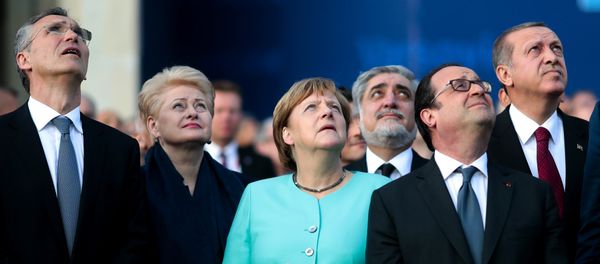 From left, NATO Secretary General, Lithuanian President Dalia Grybauskaite, German Chancellor Angela Merkel, French President Francois Hollande and Turkey’s President Recep Tayyip Erdogan watch a fly-past by NATO air forces planes during the NATO summit in Warsaw, Poland, Friday, July 8, 2016. - Sputnik International
