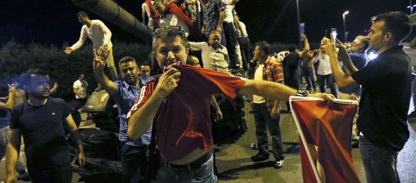 Outside Ataturk Airport In Istanbul People Stand On A Turkish Army Tank Outside Ataturk Airport In Istanbul People Stand On A Turkish Army Tank - Sputnik International
