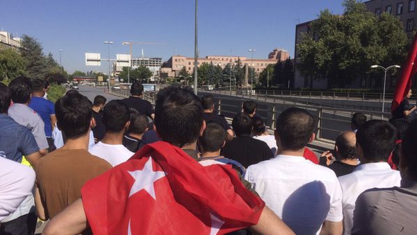 People with the Turkish national flags gather outside the military headquarters in Ankara, Turkey, Saturday July 16, 2016. - Sputnik International