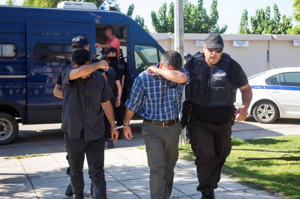 Two of the eight Turkish soldiers who fled to Greece in a helicopter and requested political asylum after a failed military coup against the government, are brought to prosecutor by two policemen in the northern Greek city of Alexandroupolis, Greece, July 17, 2016. Two of the eight Turkish soldiers who fled to Greece in a helicopter and requested political asylum after a failed military coup against the government, are brought to prosecutor by two policemen in the northern Greek city of Alexandroupolis, Greece, July 17, 2016. - Sputnik International