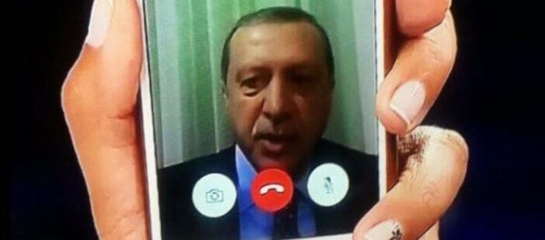 Telephone statement by Turkish President Recep Tayyip Erdogan, shown on the news on TV at an Istanbul home. - Sputnik International