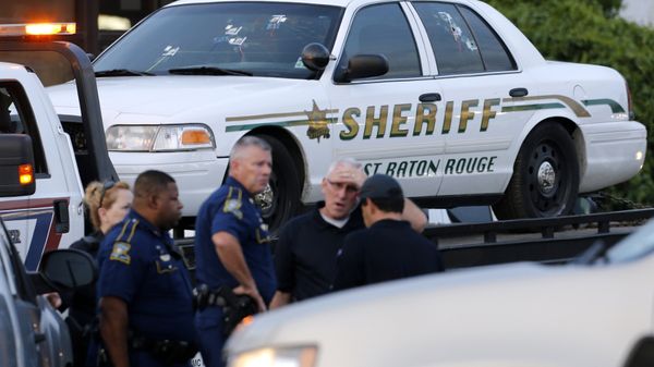 An East Baton Rouge Sheriff vehicle is seen with bullet holes in its windows near the scene where police officers were shot, in Baton Rouge, Louisiana, U.S. July 17, 2016. - Sputnik International