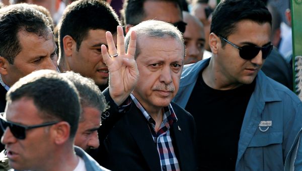 Turkish President Recep Tayyip Erdogan waves to the crowd following a funeral service for a victim of the thwarted coup in Istanbul, Turkey, July 17, 2016. - Sputnik International