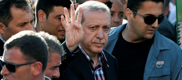 Turkish President Recep Tayyip Erdogan waves to the crowd following a funeral service for a victim of the thwarted coup in Istanbul, Turkey, July 17, 2016. - Sputnik International