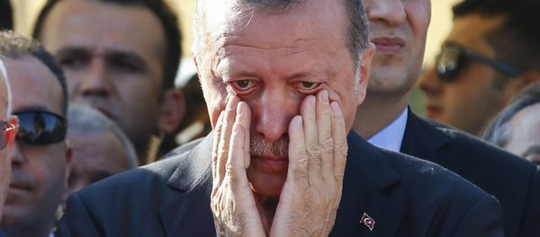 Turkish President Recep Tayyip Erdogan right, wipes his tears during the funeral of Mustafa Cambaz, Erol and Abdullah Olcak, killed Friday while protesting the attempted coup against Turkey's government, in Istanbul, Sunday, July 17, 2016. Turkish President Recep Tayyip Erdogan right, wipes his tears during the funeral of Mustafa Cambaz, Erol and Abdullah Olcak, killed Friday while protesting the attempted coup against Turkey's government, in Istanbul, Sunday, July 17, 2016. - Sputnik International