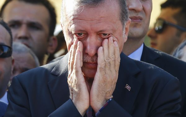 Turkish President Recep Tayyip Erdogan right, wipes his tears during the funeral of Mustafa Cambaz, Erol and Abdullah Olcak, killed Friday while protesting the attempted coup against Turkey's government, in Istanbul, Sunday, July 17, 2016. Turkish President Recep Tayyip Erdogan right, wipes his tears during the funeral of Mustafa Cambaz, Erol and Abdullah Olcak, killed Friday while protesting the attempted coup against Turkey's government, in Istanbul, Sunday, July 17, 2016. - Sputnik International
