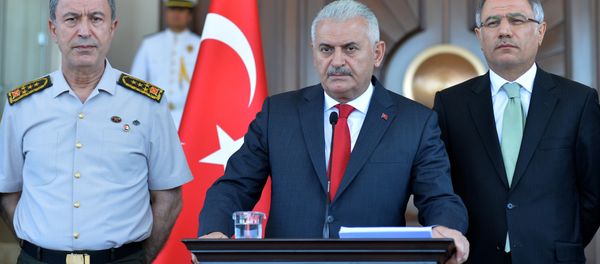 Chief of Staff General Hulusi Akar, Turkey's Prime Minister Binali Yildirim and Interior Minister Efkan Ala (LtoR) address a news conference, following an overnight attempted Turkish military coup, in Ankara, Turkey July 16, 2016 Chief of Staff General Hulusi Akar, Turkey's Prime Minister Binali Yildirim and Interior Minister Efkan Ala (LtoR) address a news conference, following an overnight attempted Turkish military coup, in Ankara, Turkey July 16, 2016 - Sputnik International