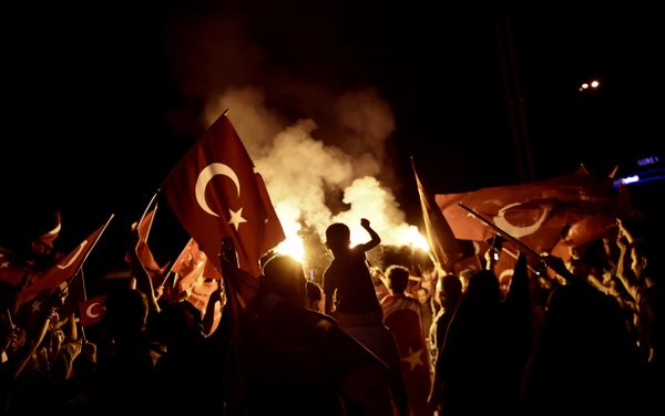 Pro-Erdogan supporters wave Turkish national flags during a rally at Taksim square in Istanbul on July 18, 2016 following the military failed coup attempt of July 15 Pro-Erdogan supporters wave Turkish national flags during a rally at Taksim square in Istanbul on July 18, 2016 following the military failed coup attempt of July 15 - Sputnik International
