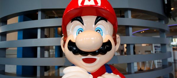 A figure depicting Mario, a character in Nintendo's Mario Bros. video games, is displayed at the company showroom in Tokyo, Japan July 14, 2016. A figure depicting Mario, a character in Nintendo's Mario Bros. video games, is displayed at the company showroom in Tokyo, Japan July 14, 2016. - Sputnik International