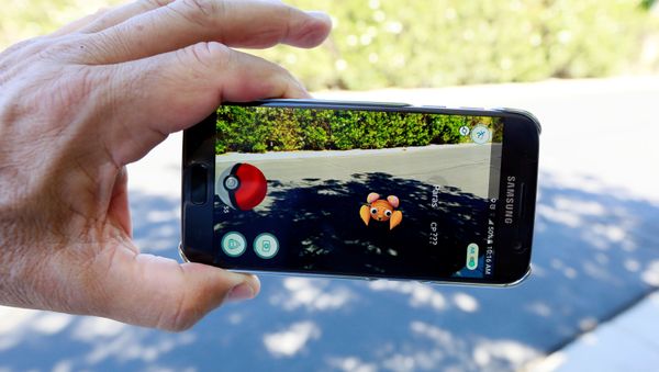 The augmented reality mobile game Pokemon Go by Nintendo is shown on a smartphone screen in this photo illustration taken in Palm Springs, California U.S. July 11, 2016 - Sputnik International