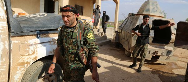 Kurdish and Arab fighters advance into the Islamic State (IS) jihadist's group bastion of Manbij, in northern Syria (File) Kurdish and Arab fighters advance into the Islamic State (IS) jihadist's group bastion of Manbij, in northern Syria (File) - Sputnik International
