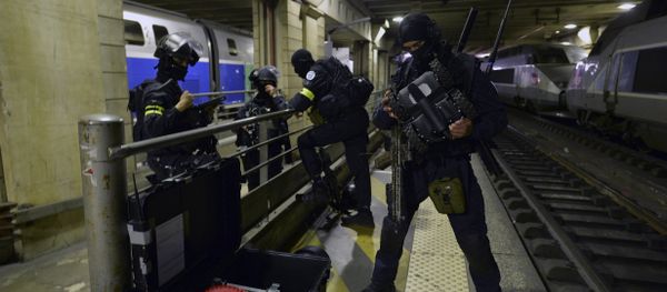 A member of the Research and Intervention Brigades(BRI) checks a robot during a terror attack exercise at the Gare Montparnasse railway station in Paris, Wednesday, April 20, 2016 A member of the Research and Intervention Brigades(BRI) checks a robot during a terror attack exercise at the Gare Montparnasse railway station in Paris, Wednesday, April 20, 2016 - Sputnik International