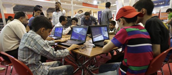 Iranians play computer games, in a computer games exhibition, at the Imam Khomeini grand mosque in Tehran, Iran (File) Iranians play computer games, in a computer games exhibition, at the Imam Khomeini grand mosque in Tehran, Iran (File) - Sputnik International