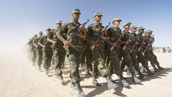 Polisario Front soldiers raise dust in their wake during a military parade in the Western Sahara village of Tifariti, file photo. - Sputnik International