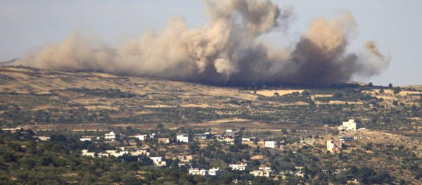 A picture taken from the Israeli-annexed Golan Heights shows smoke rising from the Syrian Druze village of Hader, on June 16, 2015 A picture taken from the Israeli-annexed Golan Heights shows smoke rising from the Syrian Druze village of Hader, on June 16, 2015 - Sputnik International