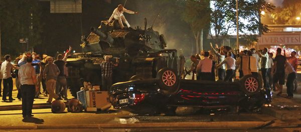 In this July 16, 2016, file photo, tanks move into position as Turkish people attempt to stop them in Ankara, Turkey - Sputnik International
