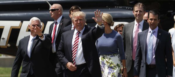 Republican U.S. presidential nominee Donald Trump (C) walks with vice presidential candidate Mike Pence (L) and family members after arriving for an event on the sidelines of the Republican National Convention in Cleveland, Ohio, U.S., July 20, 2016 Republican U.S. presidential nominee Donald Trump (C) walks with vice presidential candidate Mike Pence (L) and family members after arriving for an event on the sidelines of the Republican National Convention in Cleveland, Ohio, U.S., July 20, 2016 - Sputnik International