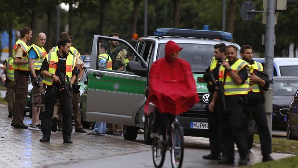Police secure a street near to the scene of a shooting in Munich, Germany July 22, 2016 - Sputnik International