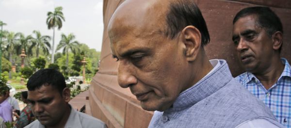Indian Home Minister Rajnath Singh, centre, comes out from parliament house. - Sputnik International