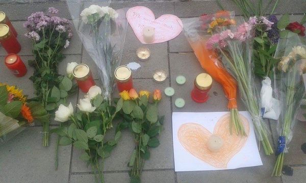 Flowers outside the Olympia shopping mall, where the shooting rampage took place in Munich, Germany. Flowers outside the Olympia shopping mall, where the shooting rampage took place in Munich, Germany. - Sputnik International