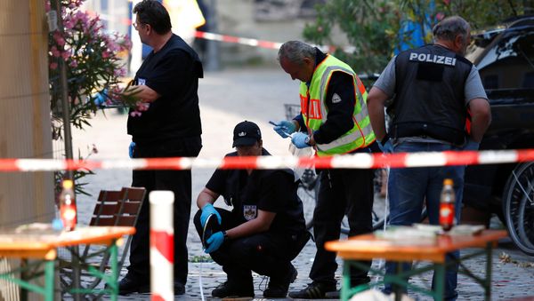 Police secure the area after an explosion in Ansbach, Germany, July 25, 2016. Police secure the area after an explosion in Ansbach, Germany, July 25, 2016. - Sputnik International