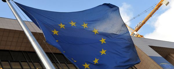 EU flag is seen in front of the EU Commission Headquarters in Brussels. (File) - Sputnik International