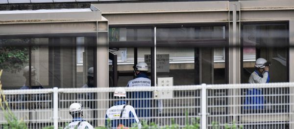 Rescue workers are seen in a facility for the disabled, where a deadly attack by a knife-wielding man took place, in Sagamihara, Kanagawa prefecture, Japan, in this photo taken by Kyodo July 26, 2016. - Sputnik International