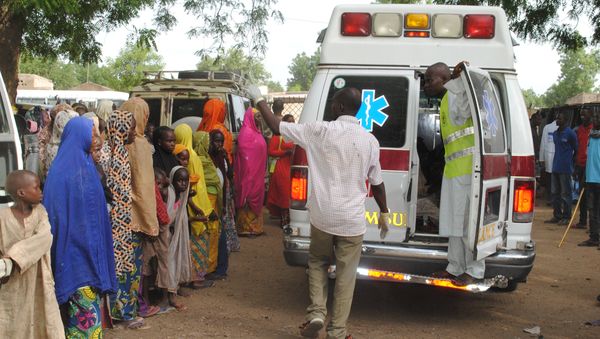 Displaced children L) watching, as malnurished and sick children are being taken away in an ambulance for treatment in Bama's camp for internally displaced people (IDP), in the outskirts of Maiduguri capital of Borno State, northeastern Nigeria (File) Displaced children L) watching, as malnurished and sick children are being taken away in an ambulance for treatment in Bama's camp for internally displaced people (IDP), in the outskirts of Maiduguri capital of Borno State, northeastern Nigeria (File) - Sputnik International