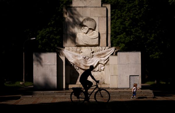 A man rides a bike in front of the monument of the Gratitude for the Soviet Army Soldiers in Warsaw, Poland May 23, 2016 A man rides a bike in front of the monument of the Gratitude for the Soviet Army Soldiers in Warsaw, Poland May 23, 2016 - Sputnik International