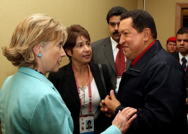 Venezuelan President Hugo Chavez listens to US Secretary of State Hilary Clinton during the Summit of the Americas in 2009 Venezuelan President Hugo Chavez listens to US Secretary of State Hilary Clinton during the Summit of the Americas in 2009 - Sputnik International