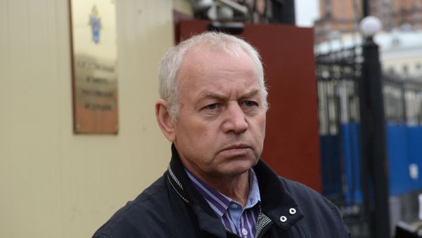 Vladimir Martynenko, snowplow driver detained in a Vnukovo private jet crash, at the Investigative Committee in Moscow. A Falcon jet crash killed four including Total President Christophe de Margerie - Sputnik International