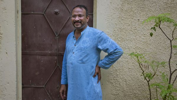 India's Bezwada Wilson, who is among the six recipients of this year's Ramon Magsaysay Award, waits to enter the Safai Karmachari Andolan (SKA) office in New Delhi, India, Wednesday, July 27, 2016 - Sputnik International