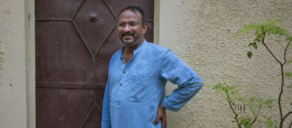 India's Bezwada Wilson, who is among the six recipients of this year's Ramon Magsaysay Award, waits to enter the Safai Karmachari Andolan (SKA) office in New Delhi, India, Wednesday, July 27, 2016 India's Bezwada Wilson, who is among the six recipients of this year's Ramon Magsaysay Award, waits to enter the Safai Karmachari Andolan (SKA) office in New Delhi, India, Wednesday, July 27, 2016 - Sputnik International