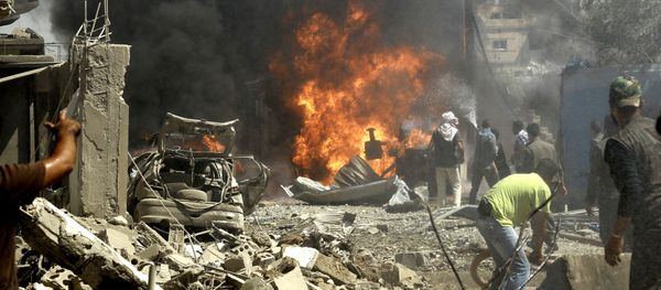 Residents gather at the site of a bomb attack in Syria's northeastern city of Qamishli on July 27, 2016 Residents gather at the site of a bomb attack in Syria's northeastern city of Qamishli on July 27, 2016 - Sputnik International
