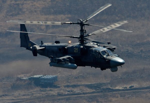 Ka-52 Alligator attack helicopter and Bal coastal missile system during bilateral drill of the Pacific Fleet's naval infantry brigade and the motor-rifle brigade of the 5th Combined Arms Army of the Eastern Military District - Sputnik International
