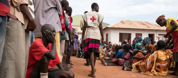 This photo taken on July 1, 2016 shows men and women waiting to be registered as displaced persons in a South Sudan Redcross compound in Wau, South Sudan This photo taken on July 1, 2016 shows men and women waiting to be registered as displaced persons in a South Sudan Redcross compound in Wau, South Sudan - Sputnik International