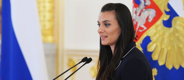 July 27, 2016. Two-time Olympic champion Yelena Isinbayeva addresses the meeting with the national Olympic team held by Russian President Vladimir Putin in the Kremlin's Alexander Hall - Sputnik International