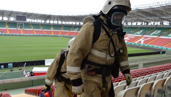 Emergencies Ministry employees during a fire and tactical exercise as part of the preparation for the 2018 FIFA World Cup at the Akhmat Arena stadium in Grozny Emergencies Ministry employees during a fire and tactical exercise as part of the preparation for the 2018 FIFA World Cup at the Akhmat Arena stadium in Grozny - Sputnik International