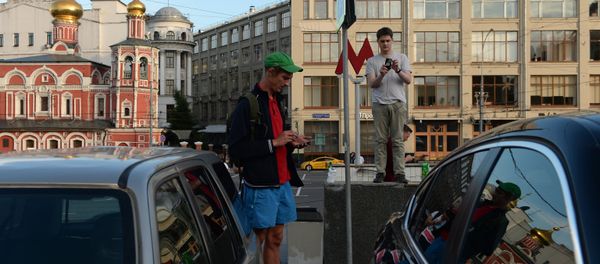 Pokemon Go players in Ilyinsky Park, Moscow - Sputnik International