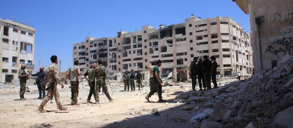 Syrian army soldiers patrol the area around the entrance of Bani Zeid after taking control of the previously rebel-held district of Leramun, on the northwest outskirts of Aleppo, on July 28, 2016 Syrian army soldiers patrol the area around the entrance of Bani Zeid after taking control of the previously rebel-held district of Leramun, on the northwest outskirts of Aleppo, on July 28, 2016 - Sputnik International
