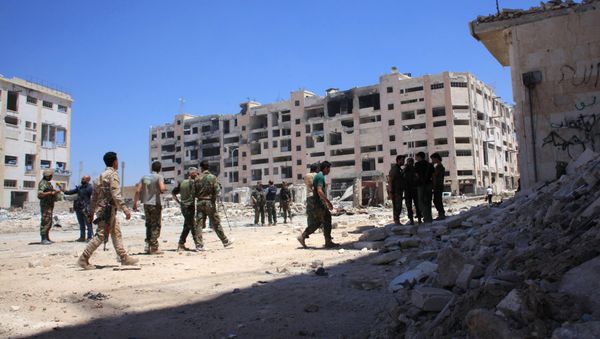 Syrian army soldiers patrol the area around the entrance of Bani Zeid after taking control of the previously rebel-held district of Leramun, on the northwest outskirts of Aleppo, on July 28, 2016 Syrian army soldiers patrol the area around the entrance of Bani Zeid after taking control of the previously rebel-held district of Leramun, on the northwest outskirts of Aleppo, on July 28, 2016 - Sputnik International