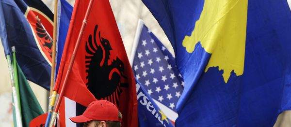A Kosovo Albanian man sells flags in Pristina on February 16, 2011 in preparation for the third anniversary of Kosovo's declaration of independence A Kosovo Albanian man sells flags in Pristina on February 16, 2011 in preparation for the third anniversary of Kosovo's declaration of independence - Sputnik International